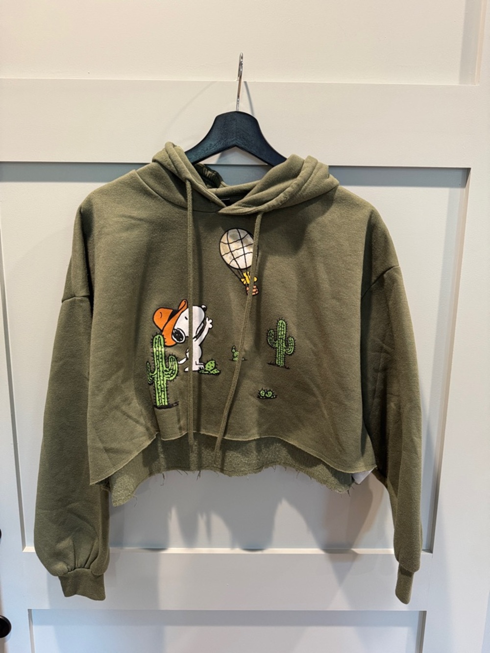 Peanuts Olive Green Cropped Hoodie with Snoopy Desert Graphic